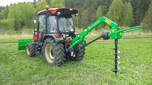 Трактор Solis-gold 60GC с земляным буром Flagman | Флагман в работе