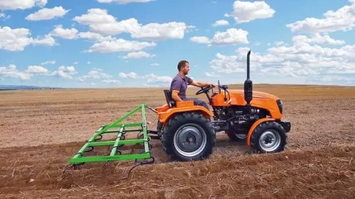 Мини-трактор Кентавр Т-220 и культиватор BOMET в работе