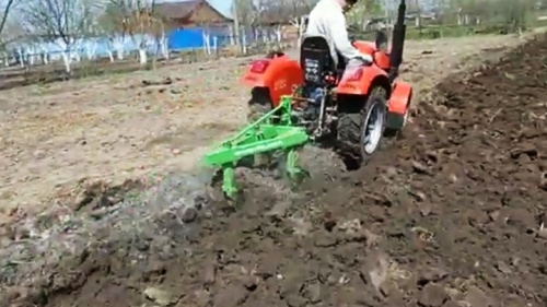 Отзыв на минитрактор Кентавр Т-244 PRO с плугом